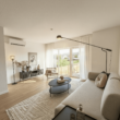 Wohnzimmer Ansicht 1 - Energieeffizient & *PROVISIONSFREI*: Wärmepumpe, PV & Klasse B – modernisiert, mit Garten & Garage