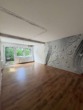 Wohnzimmer - Zweifamilienhaus mit Garten & Wintergarten – Sanierungsobjekt mit Potenzial in Bremen!