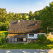 Hausansicht - Landliebe pur – Traumgrundstück mit über 10.000 m² & Sanierungsbedürftigem Einfamilienhaus!